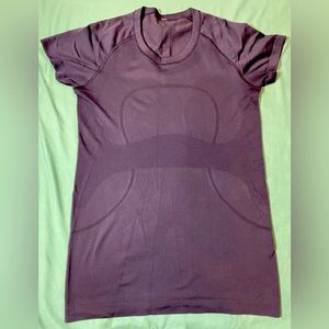 Lululemon Run Swiftly Tech Short Sleeve Shirt Size 10, dark plum color.
